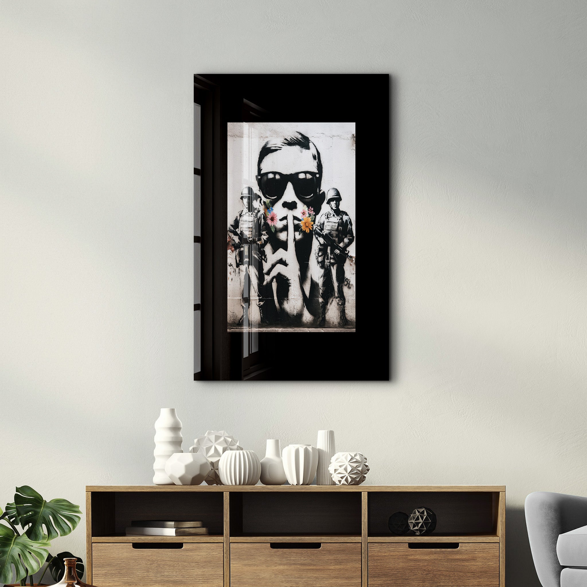 Glass wall art titled Silent Rebellion by Artdesigna, featuring urban protest street art on a sleek glass surface.