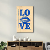 Glass wall art featuring a love kiss design by Artdesigna, with vibrant colors and a sleek glass finish for modern interior decor.