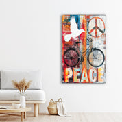 Glass wall art featuring a Peace Ride Urban Bicycle collage by Artdesigna, showcasing vibrant bicycle images on a clear glass surface.