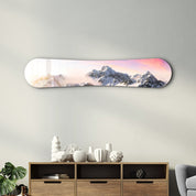 Sunrise Alpine Peaks snowboard glass wall art by Artdesigna featuring mountain scene on clear glass panel.