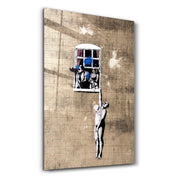 Banksy - Man hanging from a window | Glass Wall Art - Artdesigna