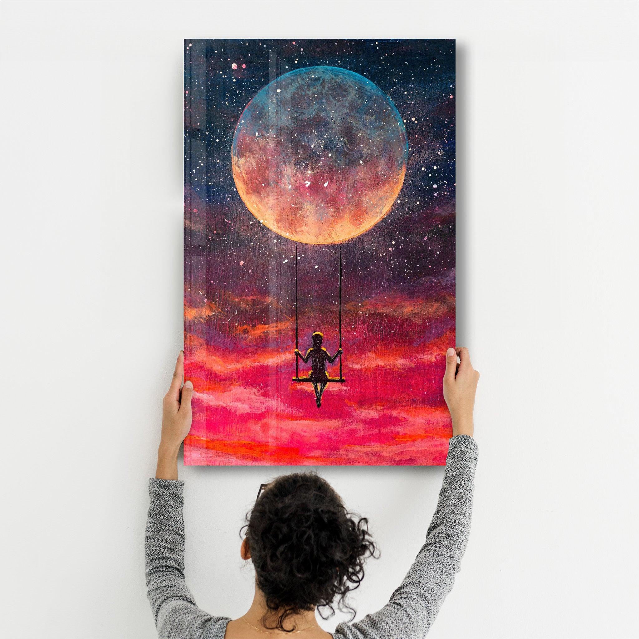 Girl Swinging Under The Moon | Glass Wall Art - Artdesigna