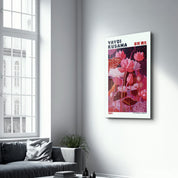 Crimson Garden glass wall art by Yayoi Kusama, featuring vibrant red and floral design, mounted on a clear glass panel.