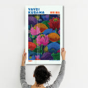 Yayoi Kusama Infinite Lotus Garden glass wall art by Artdesigna featuring vibrant, intricate lotus flower design on clear glass.