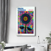 Glass wall art featuring Yayoi Kusama's Radiant Sunflower Cosmos design by Artdesigna, vibrant floral artwork on clear glass surface.