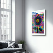 Glass wall art by Artdesigna featuring Yayoi Kusama's Radiant Sunflower Cosmos design on clear glass panel.