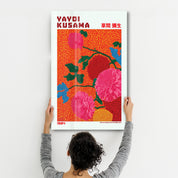 Glass wall art by Artdesigna featuring Yayoi Kusama's Scarlet Bloom Garden (1984) with vibrant red floral patterns on clear glass.