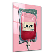 Colorful glass wall art titled "Love Transfusion" featuring pop surreal minimalism by Artdesigna, displayed on a wall.