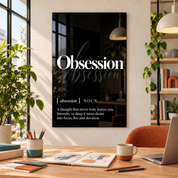 Obsession Definition glass wall art by Artdesigna, black and white typography print in a home office