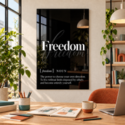 Freedom Definition glass wall art by Artdesigna, black and white typography print in a home office