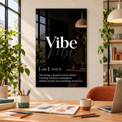 Vibe Definition glass wall art by Artdesigna, black and white typography print in a home office