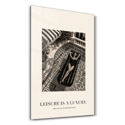 Artdesigna “Leisure Is a Luxury” glass wall art with elegant studio design details