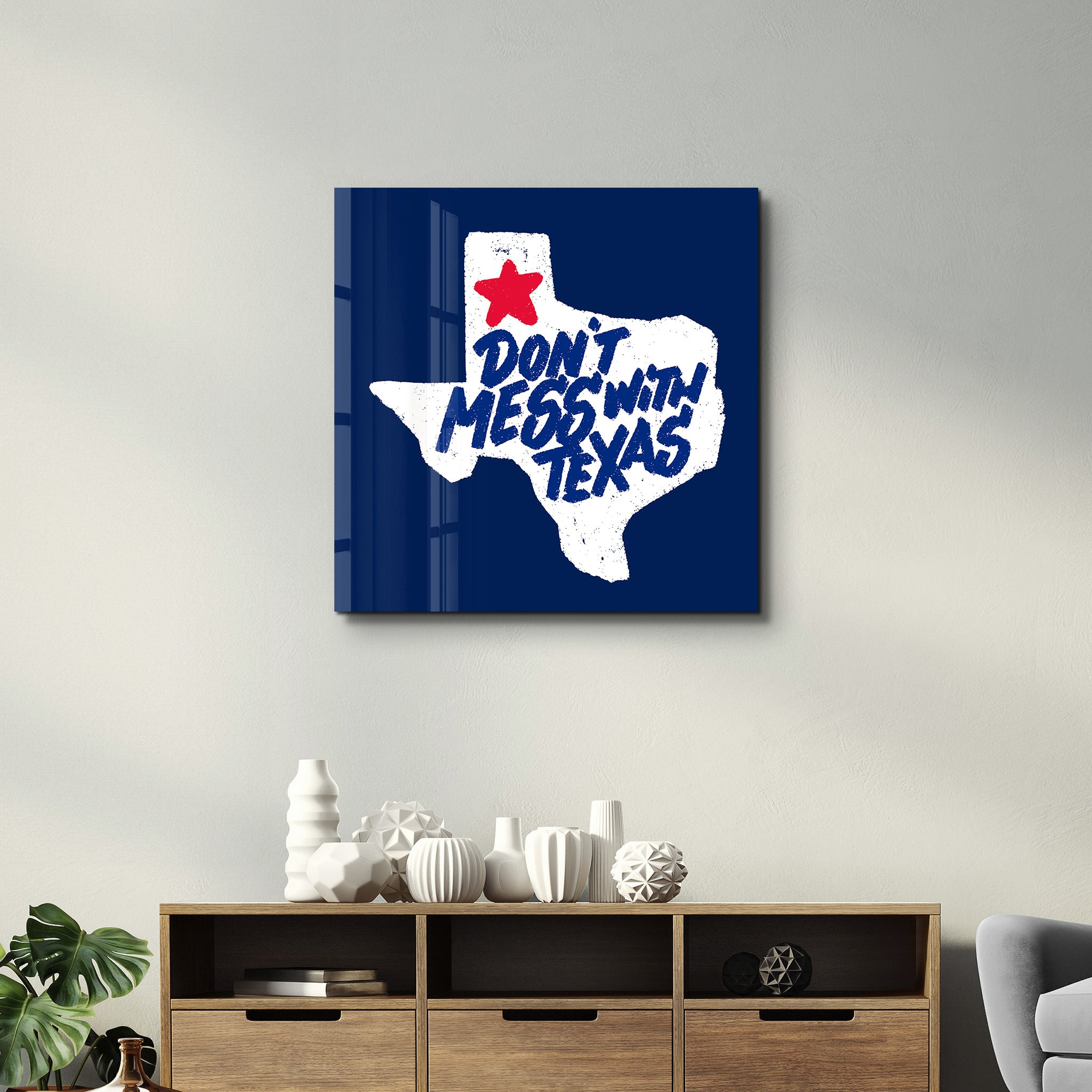 Glass wall art featuring the Lone Star Attitude Don’t Mess With Texas design by Artdesigna, with a 16x16 inch glass display.