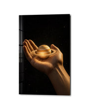 Glass wall art titled Saturn in the Palm by Artdesigna, featuring a detailed glass depiction of Saturn within a sleek frame.