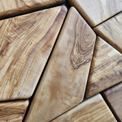 Handmade olive wood geometric wall sculpture, wooden wall art with intricate geometric patterns, crafted by Artdesigna.