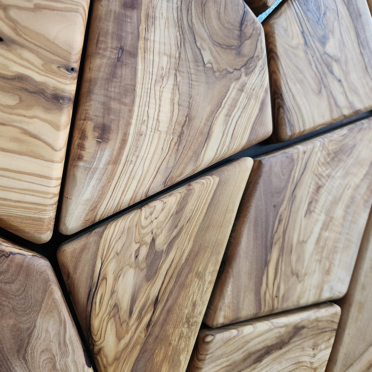 Handmade olive wood geometric wall sculpture by Artdesigna, showcasing intricate wooden wall art with natural grain details.