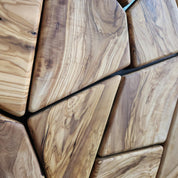 Handmade olive wood geometric wall sculpture by Artdesigna, showcasing intricate wooden wall art with natural grain details.
